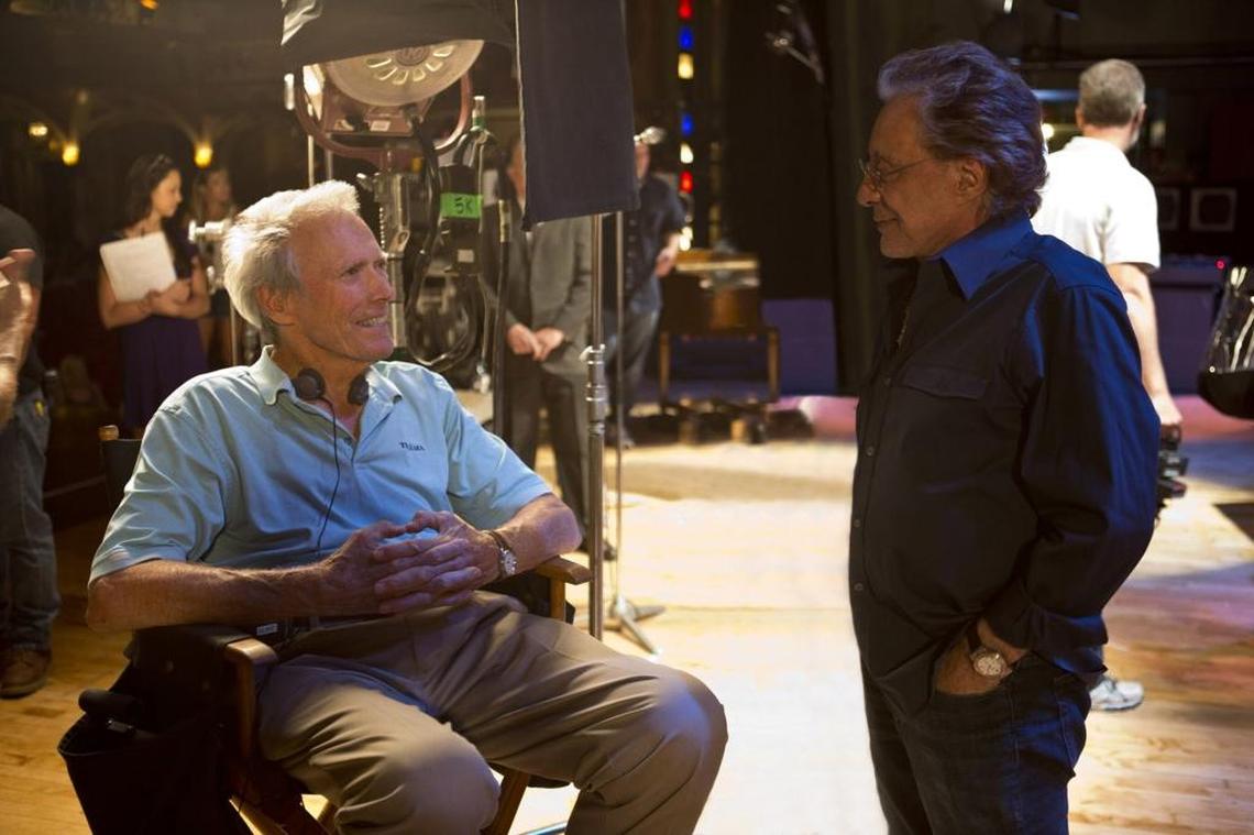 Director/producer Clint Eastwood, left, and executive producer Frankie Valli, chat on the set of “Jersey Boys.” The film adaptation of the hit Broadway musical opened in 2014.