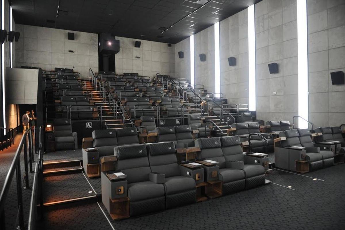 The reclining seats at CMX come with a blanket (and free popcorn).