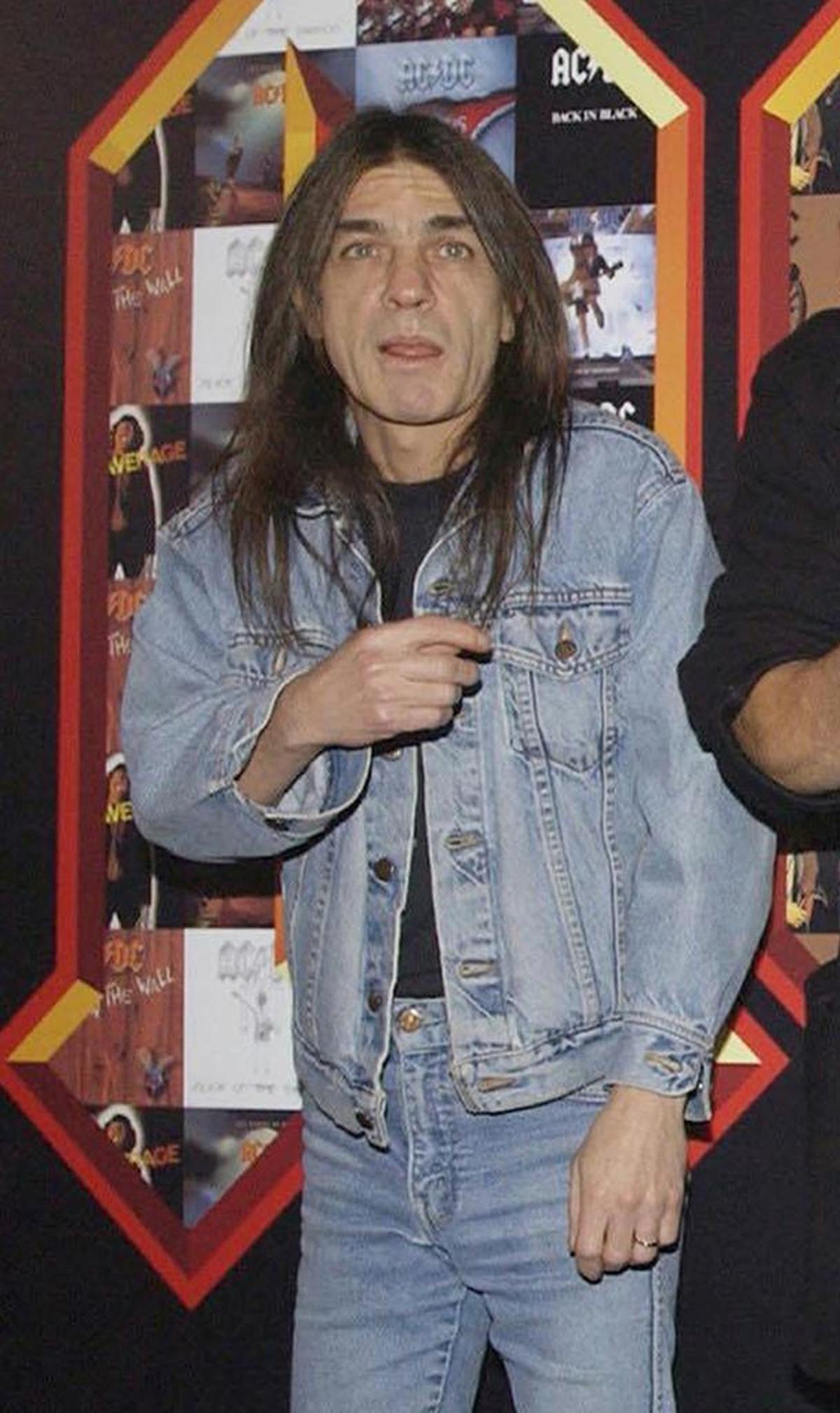 A March 3, 2003, file photo of AC/DC co-founder and guitarist Malcolm Young at an event in London. The 64-year-old Young died on Saturday, Nov. 18, 2017, the band announced.