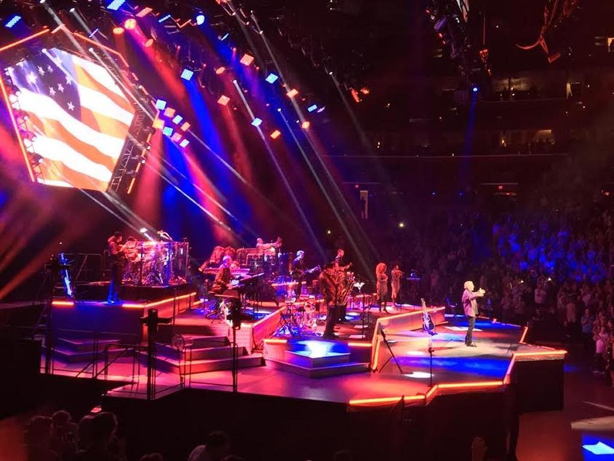 During “America,” one of the encores of Neil Diamond’s 50th Anniversary Tour, the performer reminded his audience of what this country stands for — Lady Liberty in the New York harbor, welcoming immigrants like his parents, descendants of Russian and Polish immigrants.