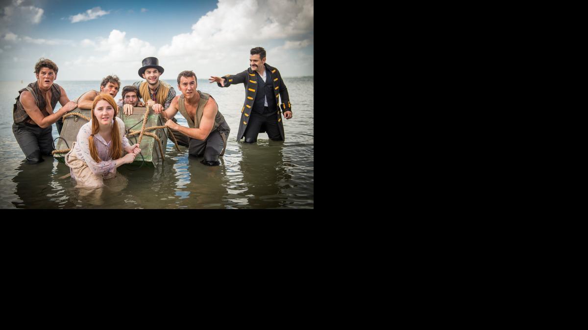 
PIRACY AND PUBERTY: Nicholas Richberg as the pirate Black Stache menaces the marooned kids in ‘Peter and the Starcatcher’ at the Arsht Center.
