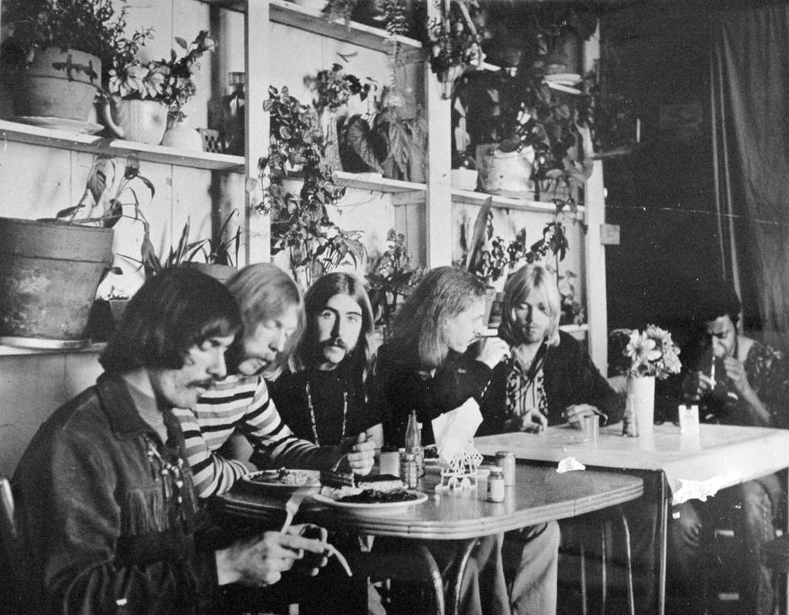 In this undated photo circa 1971, members of the Allman Brothers Band, from left, Dickey Betts, Duane Allman, Berry Oakley, Butch Trucks, Gregg Allman and Jai Johanny "Jaimoe" Johanso, eat at the H&H Restaurant in downtown Macon, Ga.