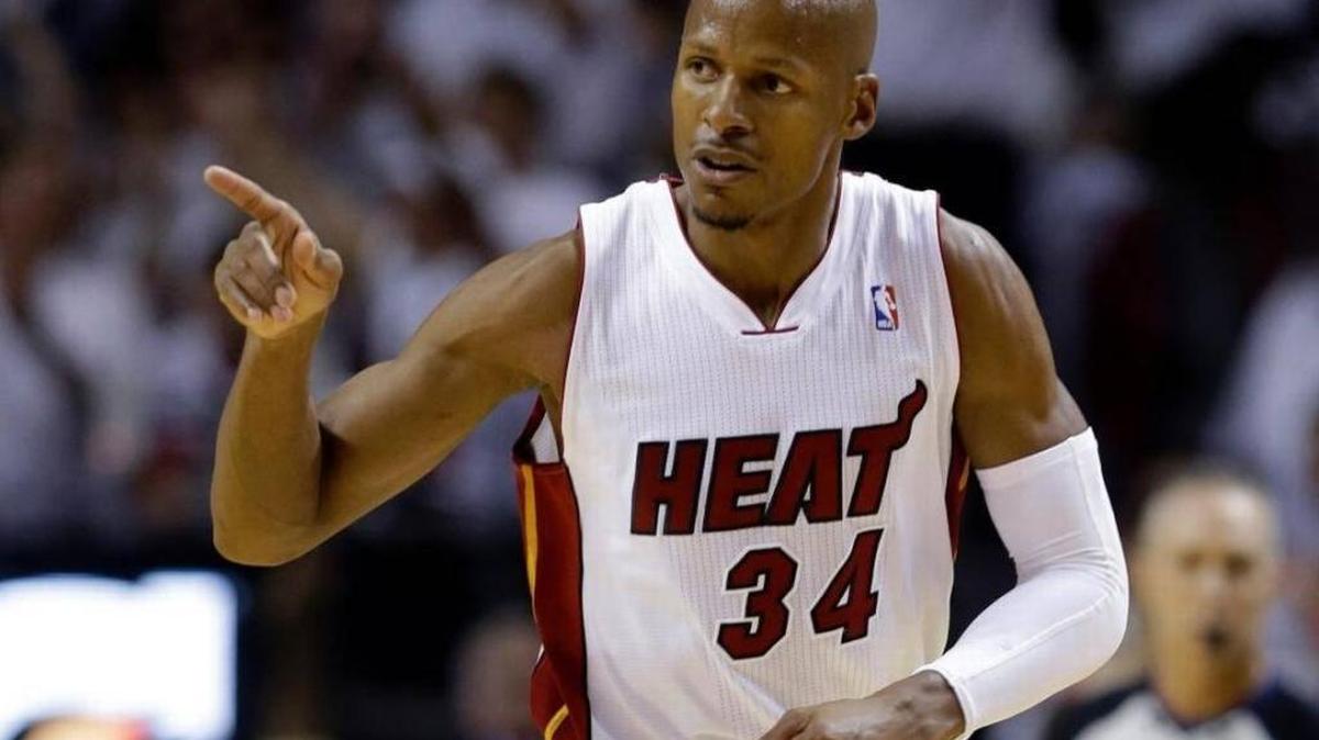 In this May 30, 2014, file photo, Miami Heat guard Ray Allen gestures after scoring a three-point shot during the first half of Game 6 in the NBA basketball playoffs Eastern Conference finals against the Indiana Pacers in Miami
