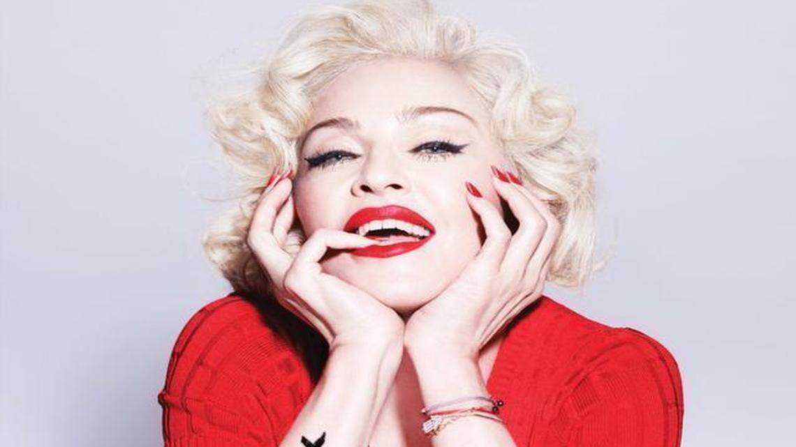 
MADONNA THE REBEL: On the CD cover image for the Deluxe version of Madonna’s 13th studio album, ‘Rebel Heart,’ released Tuesday, the singer-songwriter reveals the title on her arm. The 19-song Deluxe and 25-song Super Deluxe versions touch on love, sex, life and career and feature a slew of contemporary collaborators. 
