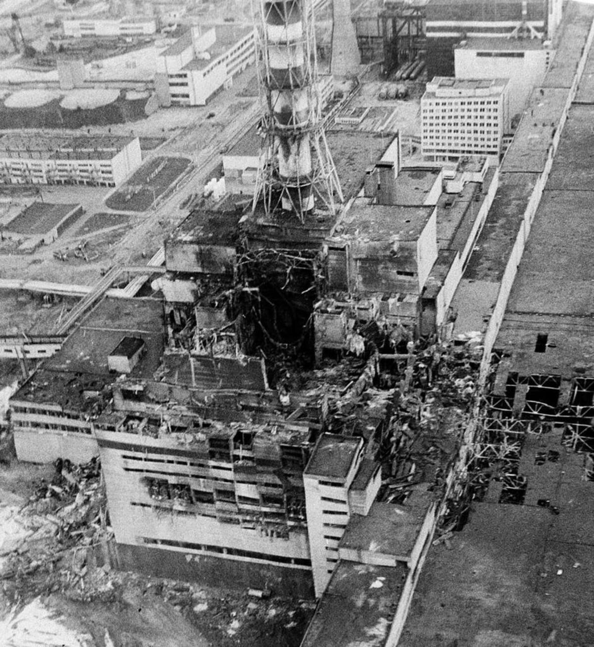 An aerial view of the Chernobyl nuclear power plant, the site of the world's worst nuclear accident, is seen in April 1986, made two to three days after the explosion in Chernobyl, Ukraine. In front of the chimney is the destroyed fourth reactor.