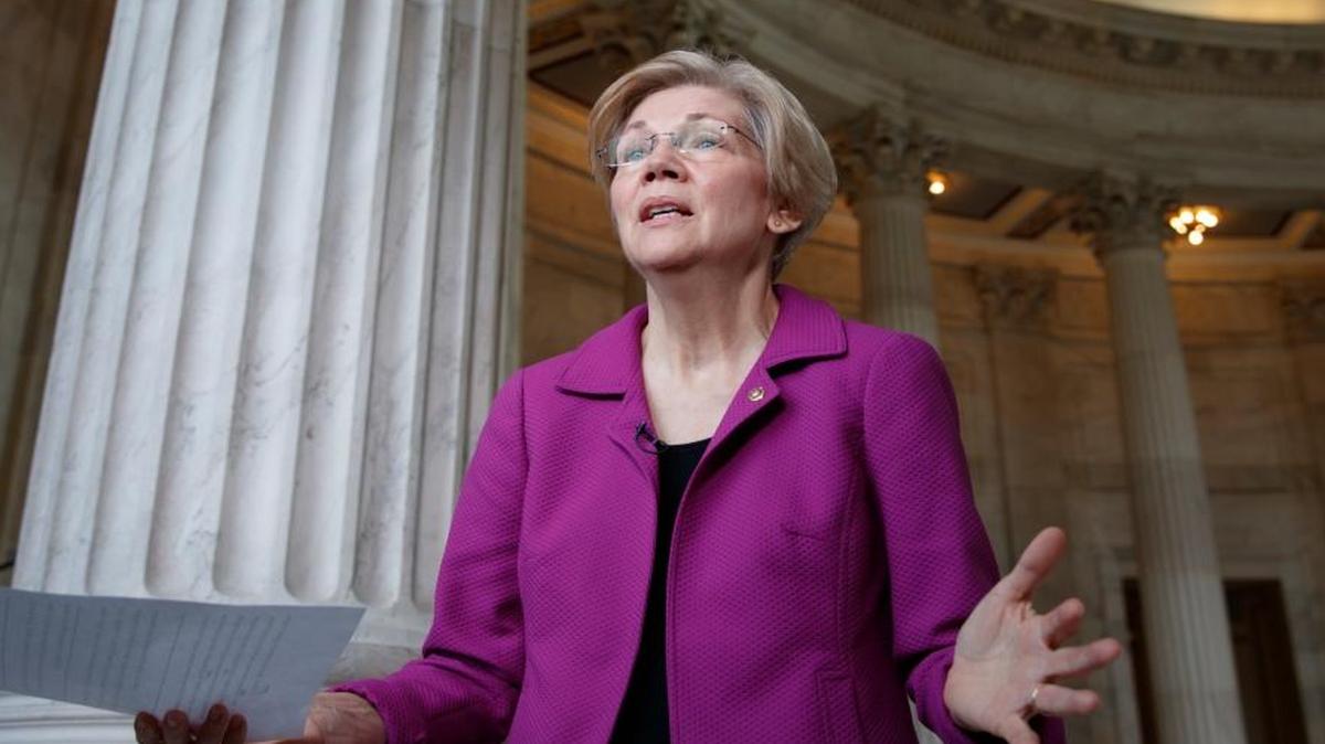 Holding a transcript of her speech in the Senate Chamber, Democratic Sen. Elizabeth Warren of Massachusetts reacts to being rebuked by the Senate leadership and accused of impugning a fellow senator, Sen. Jeff Sessions, R-Ala., the attorney general nominee, in Washington.