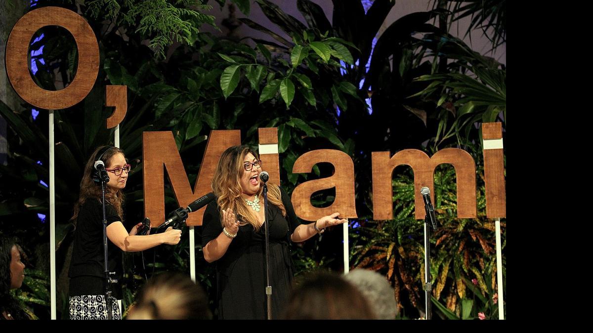 
Alicia Zuckerman, Editorial Director of WLRN-Miami Herald News, records Odette Barrientos of ZIP code 33013 (Hialeah) as she reads her poem during the finale of the O, Miami poetry contest, ‘Ode to your ZIP code,’ on Wednesday, April 29, 2015 at Vizcaya in Coconut Grove
