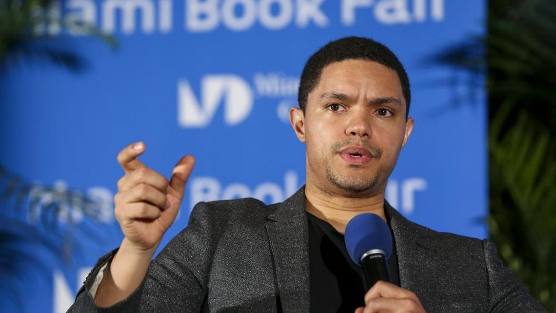 Trevor Noah talks about his book "Born a Crime" during the Miami Book Fair at Miami Dade College’s Wolfson Campus on Sunday, Nov. 13, 2016.