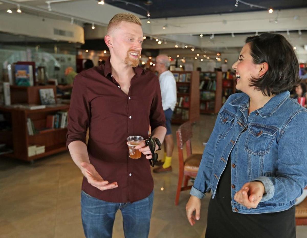 Tim Hayes talks with chef Adriana Egozcue at The Bookstore in the Grove.