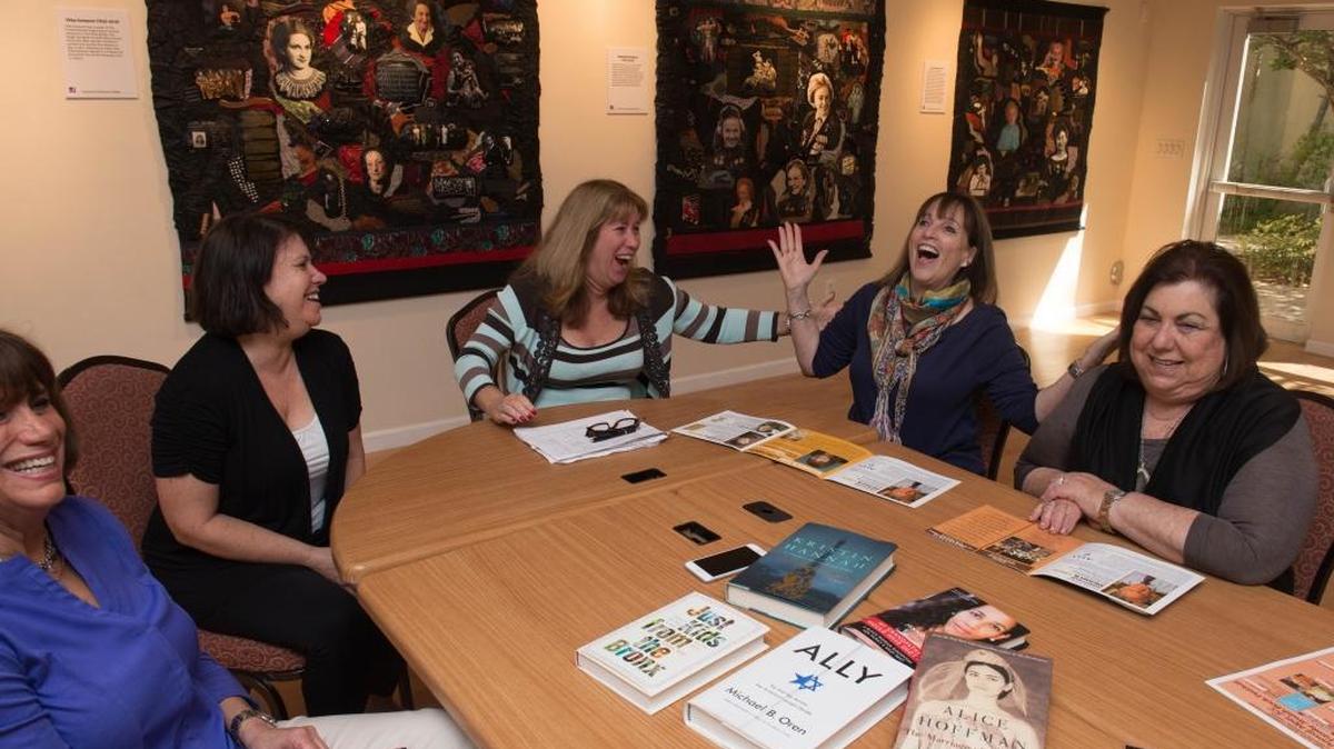 
Marcy Levitt, director of literary and performing arts at Alper JCC, in center, and, from left, Susan Spatzer, Cheryl Rosen, Nadine Barocas and Elaine Katz, far right, are working to coordinate the 35th annual Alper JCC Berrin Family Jewish Book Festival and Women's Day Luncheon.
