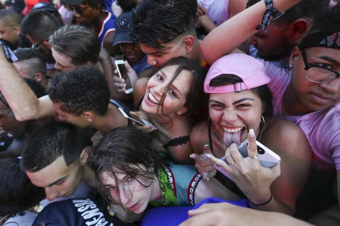 Festival-goers get squished during XXXTentacion's performance during the second day of the Rolling Loud Festival in downtown Miami on Saturday, May 6, 2017.