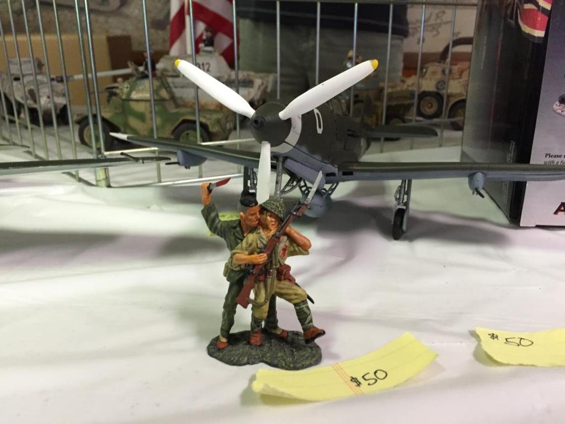 A Marine battles a Japanese soldier.