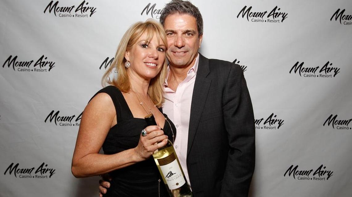 The Real Housewives Of New York City’s Ramona Singer poses with husband Mario Singer at Mount Airy Casino Resort during a special tasting of Ramona's Pinot Grigio on March 31, 2012 in Mount Pocono, Pennsylvania.