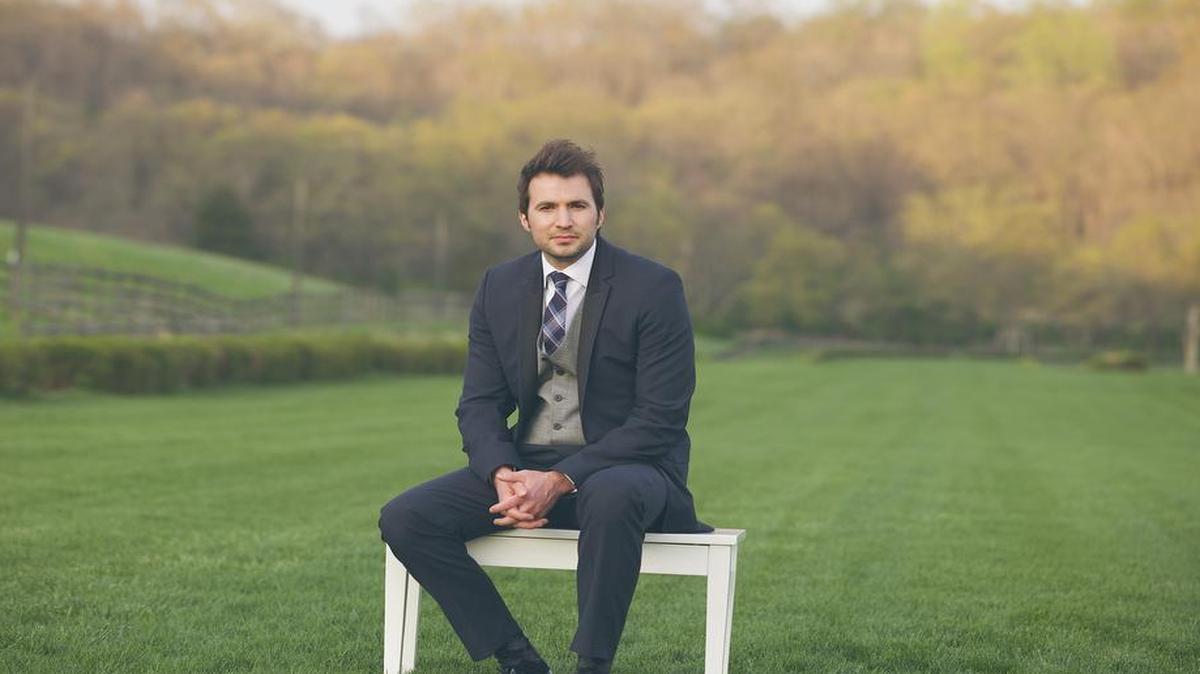 
Nathan Pacheco in a field

