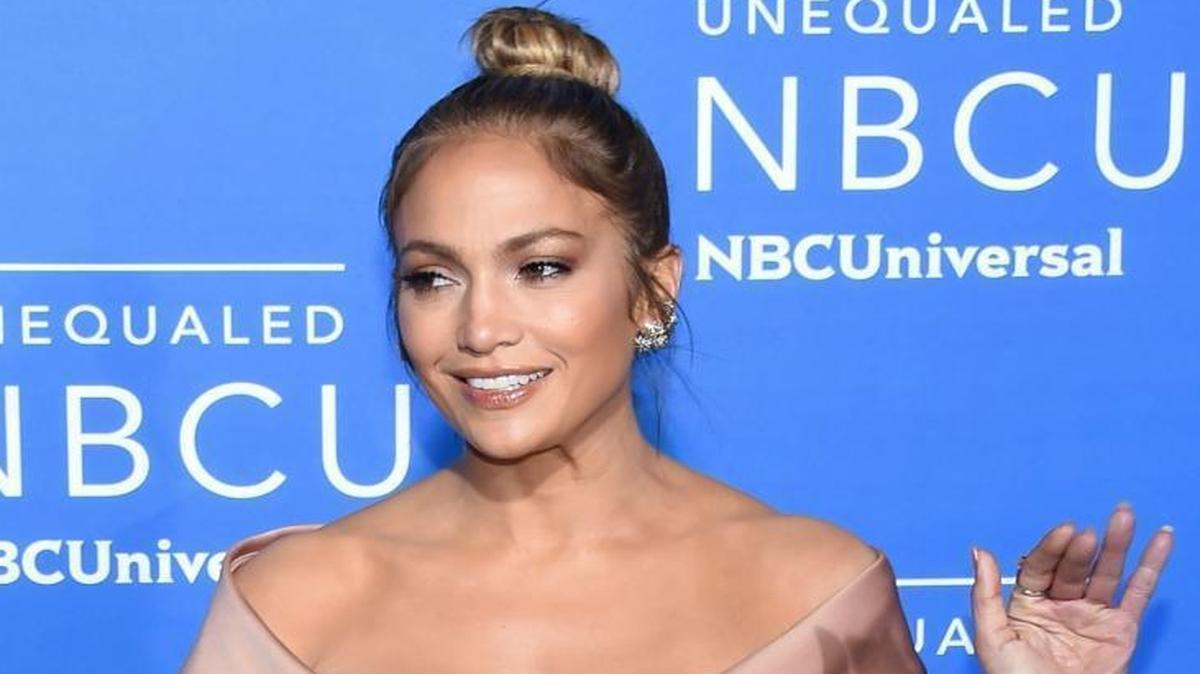 FILE - In this May 15, 2017 file photo, Jennifer Lopez attends the NBCUniversal Network 2017 Upfront in New York. NBC is saying bye-bye this year to its tradition of an annual live holiday musical. The network is confirming that "Bye Bye Birdie" starring Lopez has been pushed from its announced December airdate into 2018 on an as-yet-undetermined night. (Photo by Evan Agostini/Invision/AP, File)