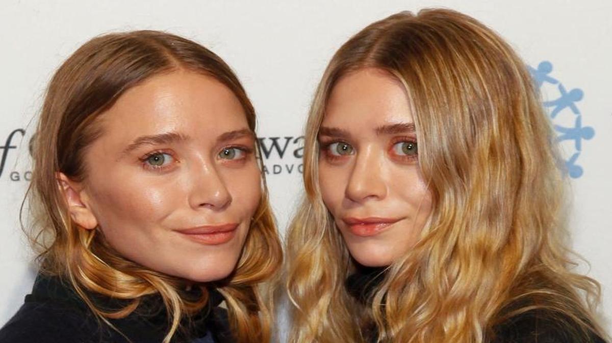 
FILE - In this Thursday, Nov. 6, 2014, file photo, Mary-Kate Olsen, left, and Ashley Olsen attend the 2014 World of Children Awards at 583 Park Avenue, in New York. Shahista Lalani, a former intern, has sued the Olsen twins' licensing and manufacturing company, saying she worked 50 hours a week but wasn't paid. (Photo by Andy Kropa/Invision/AP, File)
