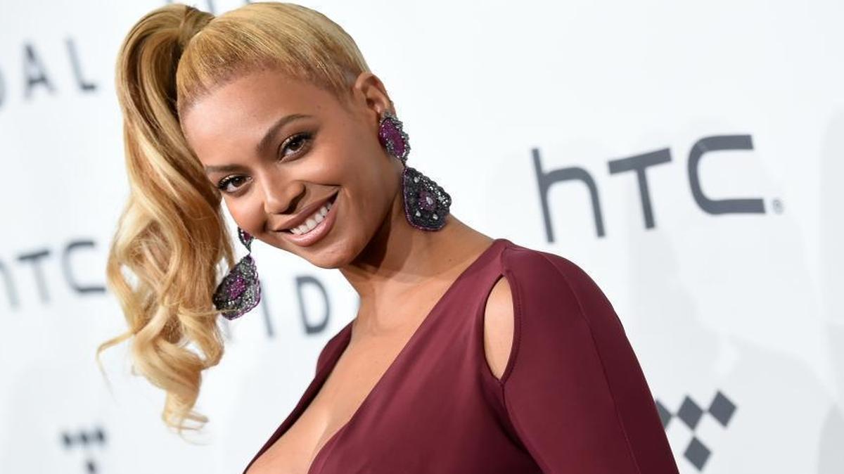 In this Oct. 20, 2015 file photo, singer Beyonce Knowles arrives at TIDAL X: 1020 Amplified by HTC in New York. Beyonce is launching an active wear line for women next month. The singer announced the 2016 spring/summer collection called Ivy Park