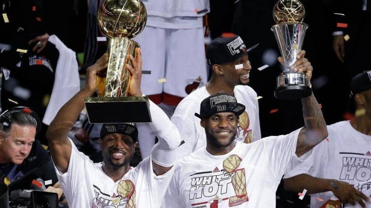 LeBron James and Dwyane Wade with their Heat championship trophies. Good times.