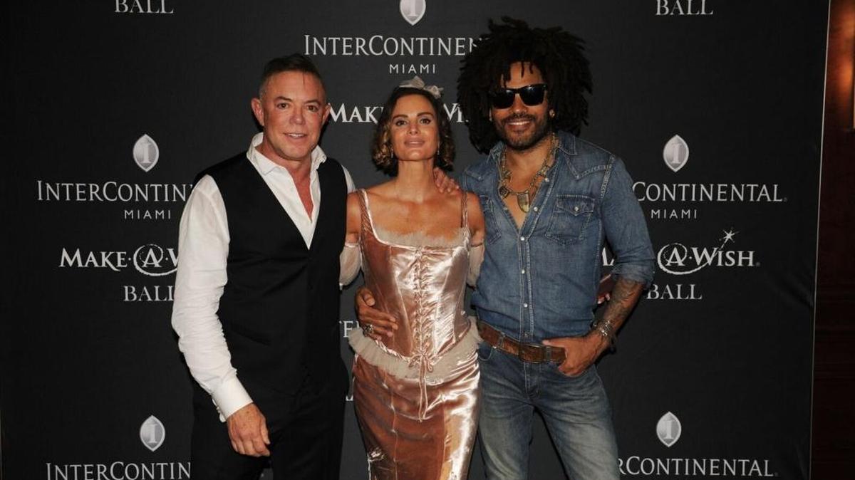 Make-A-Wish ball organizer Shareef Malnik, left, his wife, actress Gabrielle Anwar, and Lenny Kravitz.