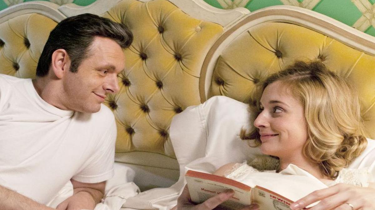 
Michael Sheen as Dr. William Masters and Caitlin Fitzgerald as Libby Masters in "Masters of Sex." The difficult part about this show, says the executive producer Michelle Ashford, is making the love scenes not sexy. (Patrick Wymore/Showtime) 
