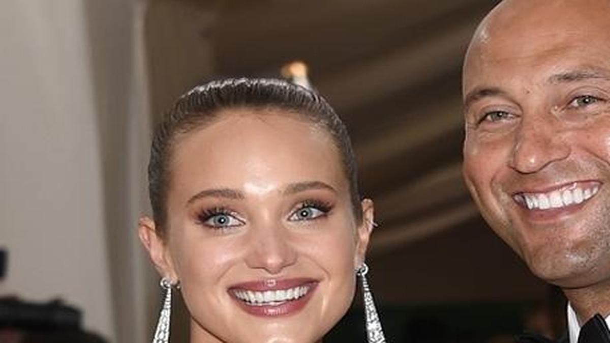Hannah Davis, left, and Derek Jeter arrive at The Metropolitan Museum of Art Costume Institute Benefit Gala, celebrating the opening of "Manus x Machina: Fashion in an Age of Technology" on Monday, May 2, 2016, in New York.