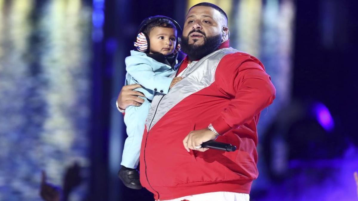 DJ Khaled performs "I'm The One" while holding his son Asahd at the BET Awards at the Microsoft Theater on Sunday, June 25, 2017, in Los Angeles.