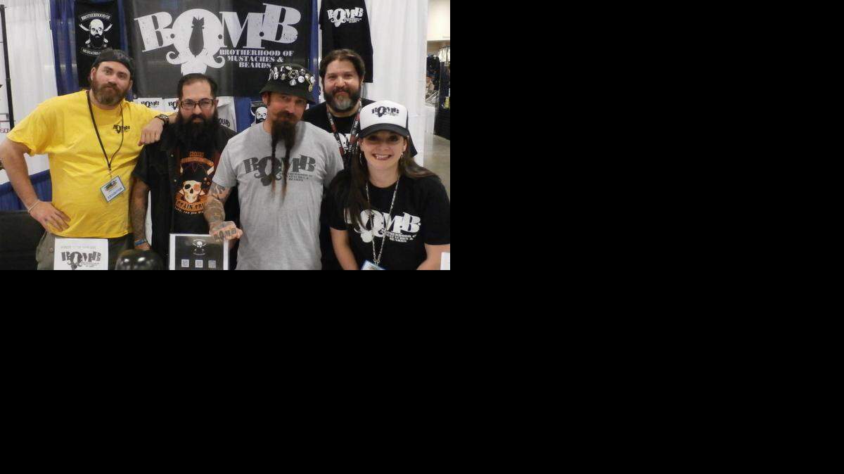 
PHOTO BOMB: Founded in 2011, BOMB (Brotherhood of Mustaches & Beards) is a non-profit social/facial hair club in South Florida, benefiting charities like Autism Speaks, Miami Children’s Hospital, Quantum House, Snook & Gamefish Foundation and various holiday toy drives. BOMB raised funds at its booth during Shock Pop Comic Con Feb 13-15 at the Broward County Convention Center in Fort Lauderdale. From left, Steve Hussey, West Palm Beach vice president; Damien Stein, original member; Brian Powell, founder/president; Rafael Perez, Broward vice president; and Kelly Ainsworth, BOMBshell. Visit www.beardedbomb.com
