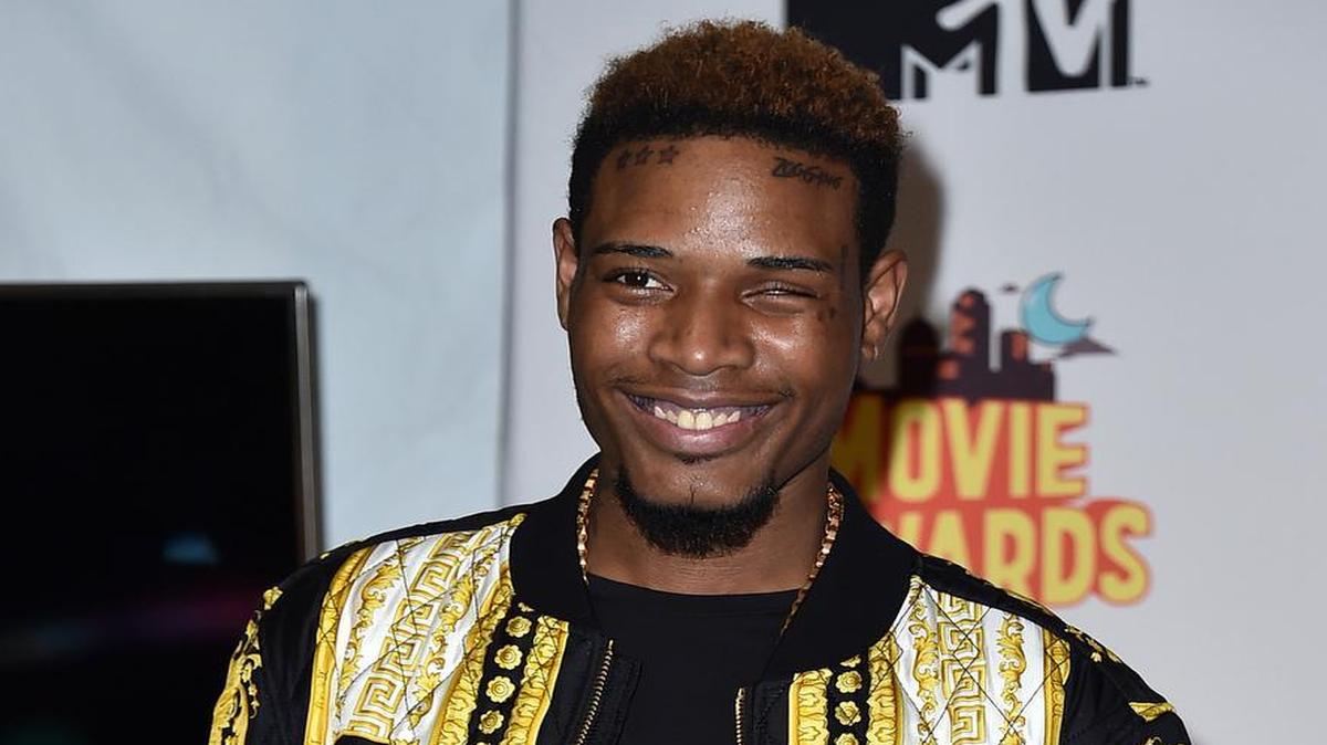 
FILE - In this April 12, 2015, file photo, Fetty Wap poses in the press room at the MTV Movie Awards at the Nokia Theatre in Los Angeles. Wap has had an unprecedented amount of success without the release of an album: The rapper-singer is enjoying another week with two songs in the Top 10 on the Billboard Hot 100 chart (a third track sits in the Top 20), he’s on tour with Chris Brown and he even surprised Taylor Swift’s audience at one of her recent shows with his ubiquitous hit, “Trap Queen.” After much anticipation, Wap is finally ready to release his debut album on Sept. 25, 2015, just days before the deadline for Grammy eligibility. (Photo by Jordan Strauss/Invision/AP, File)

