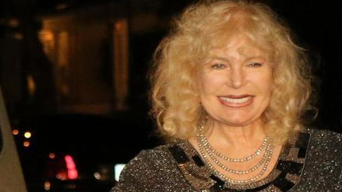 Loretta Swit with M*A*S*H jeep at entrance to the FLIFF party at Villa De Palma in Fort Lauderdale.
