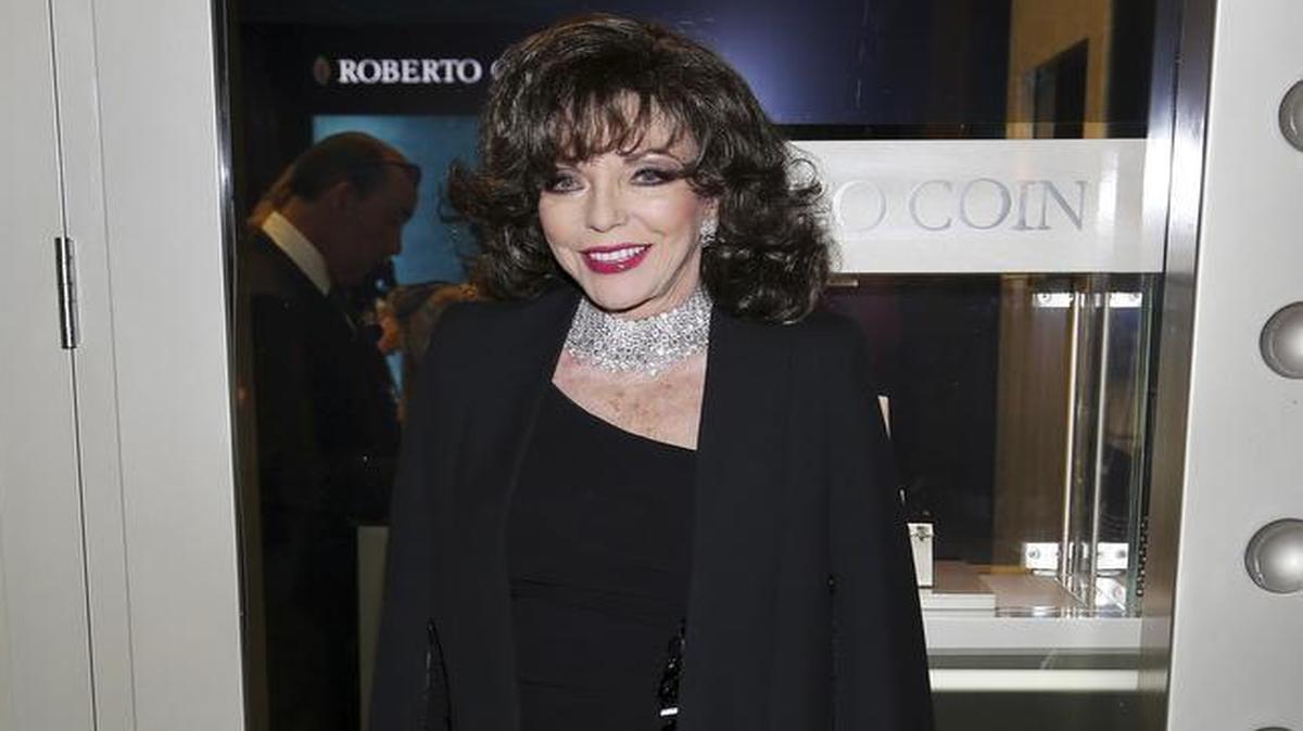 Actress Joan Collins attends the Grand Opening of the Roberto Coin Flagship Store in Miami on February 10, 2016.