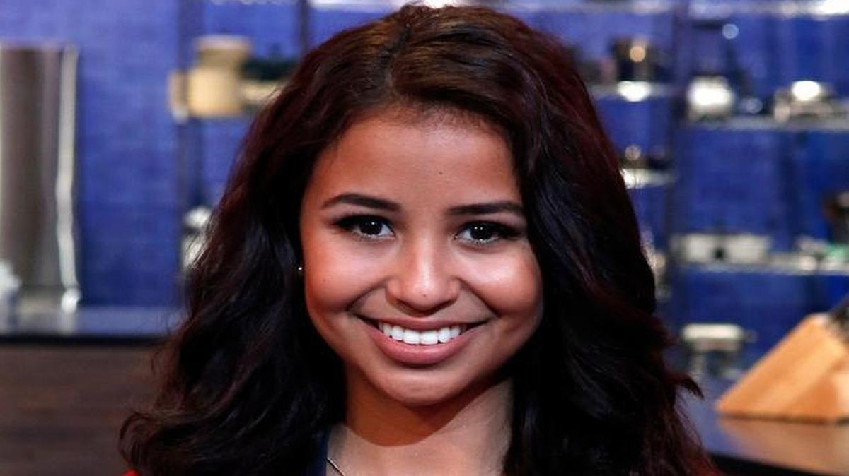 Zoe Kelly poses on the set of Food Network's All Star Academy, Season 2.