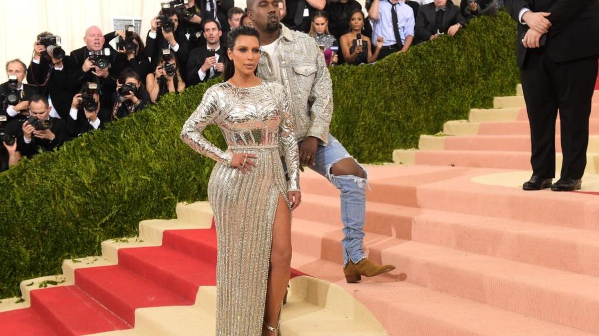 Kim Kardashian, left, and Kanye West arrive at The Metropolitan Museum of Art Costume Institute Benefit Gala, celebrating the opening of "Manus x Machina: Fashion in an Age of Technology" on Monday, May 2, 2016, in New York.