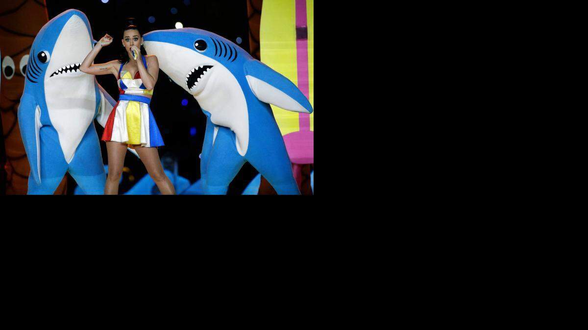 
Katy Perry performs during halftime of the NFL Super Bowl XLIX football game in Glendale, Ariz. The dancing sharks that stole some of the spotlight during Perry's Super Bowl halftime show have taken a bite out of an artist's bid to sell small figurines of them. 
