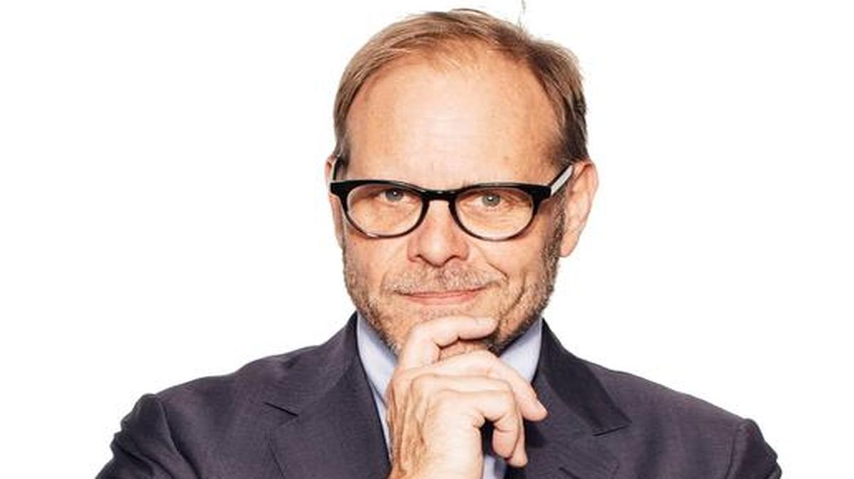 In this Oct. 26, 2016 photo, Alton Brown poses for a portrait in New York to promote his cookbook, "EveryDayCook: This Time It’s Personal," and a live Broadway variety show with a mix of unusual food demonstrations, puppets and songs. (Photo by [Victoria Will]/Invision/AP)