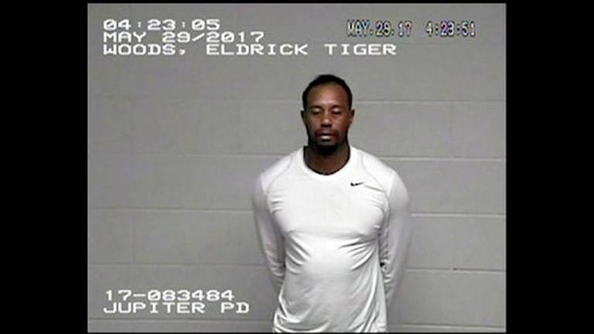 In this Monday, May 29, 2017, image made from a surveillance video provided by the Jupiter Police Department, Tiger Woods stands in Palm Beach County jail following his DUI arrest in Palm Beach County, Fla. Woods told the officers he had not been drinking, and two breath tests at the jail registered a 0.0 blood-alcohol level. Woods is to be arraigned July 5 in Palm Beach County Court.