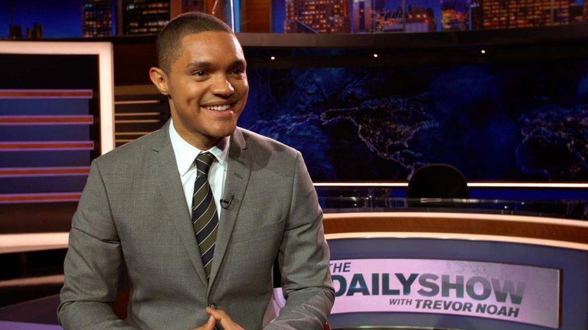 In this Sept. 25, 2015 image taken from video, Trevor Noah appears on the set of his new show, "The Daily Show with Trevor Noah," in New York.