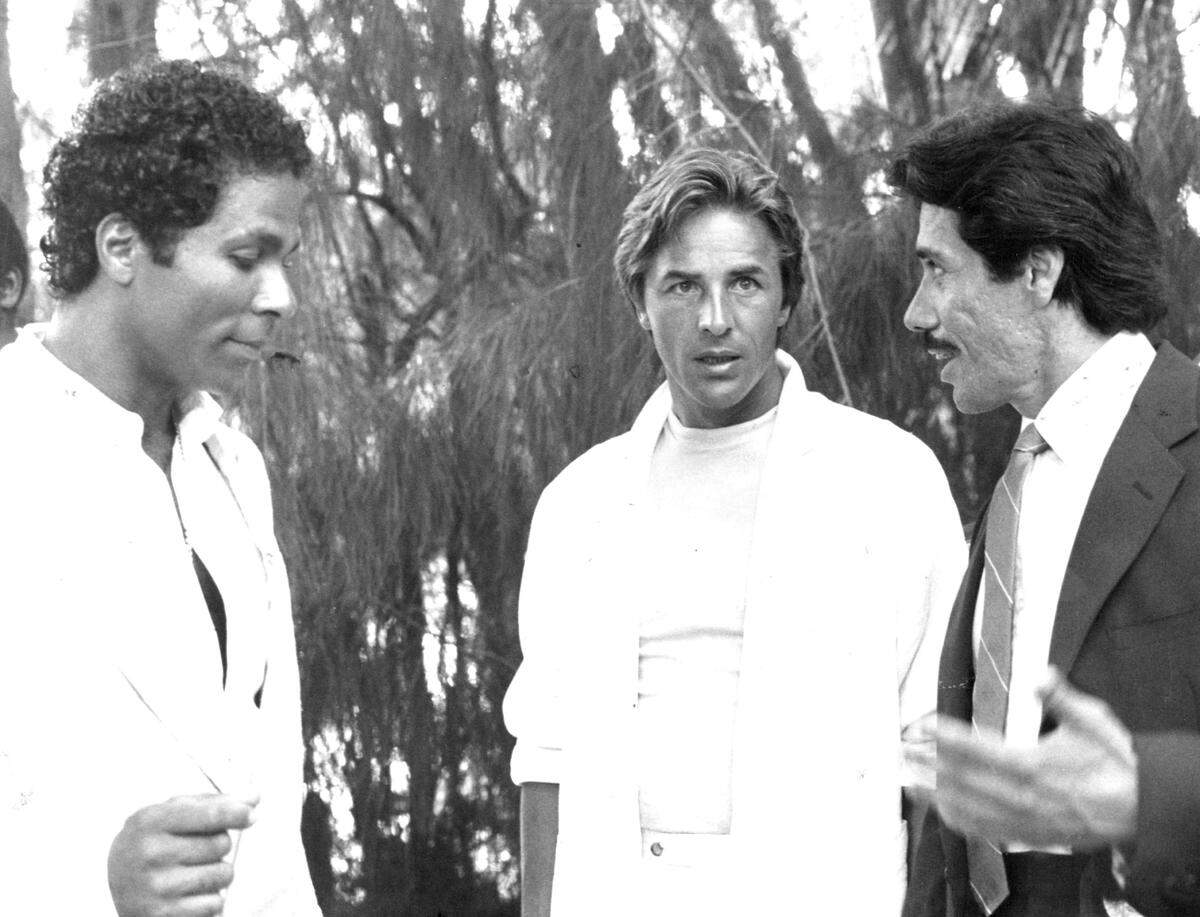 Running It Down - Detective Crockett (Don Johnson, Center) Tries to Explain to his Partner, Tubbs (Philip Michael Thomas, Left), and his Boss, Lieutenant Castillo (Edward James Olmos), how he was Framed for Accepting Dirty Money - a Tough Argument Considering the Evidence - in "One - Eyed Jack," on NBC - TV's "Miami Vice" Friday, Nov. 2 (10 - 11 p.m. NYT). 