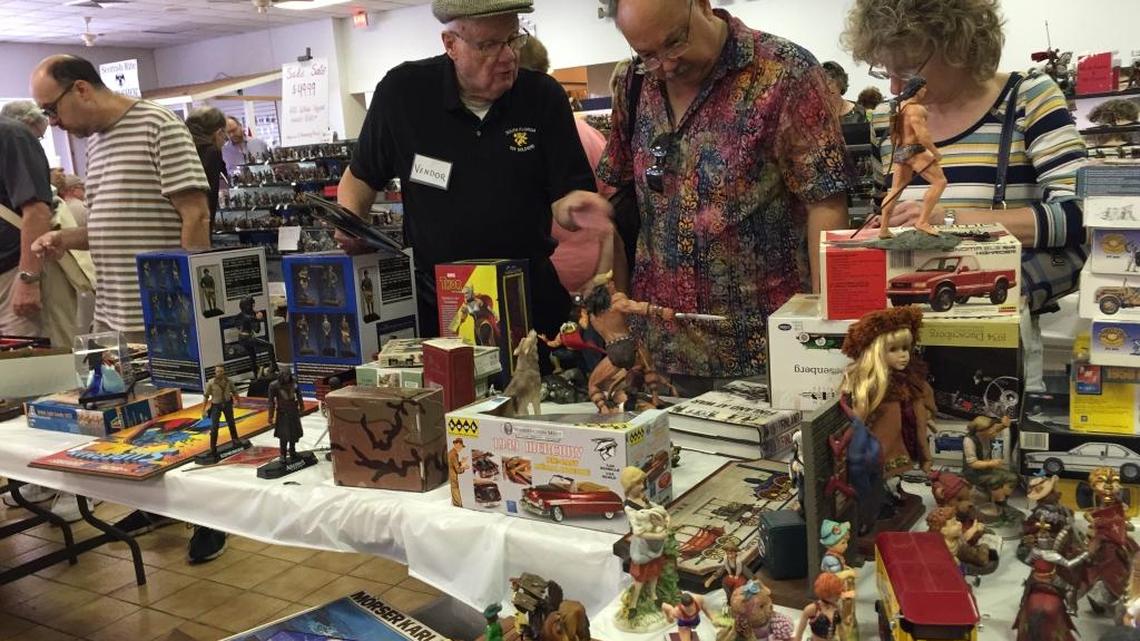 Customers browse the collectibles at the Florida Toy Soldier Show at the Scottish Rites Masonic Hall in Lake Worth on Sunday, Jan. 28, 2018.