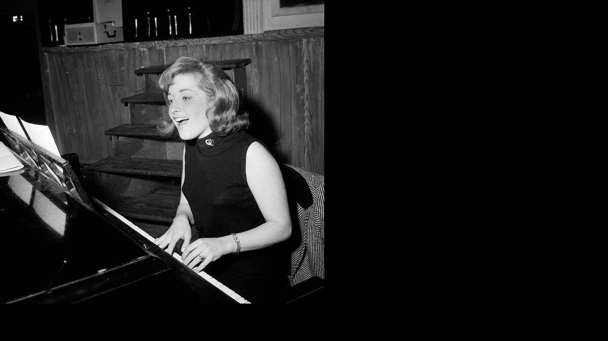 
 In this Jan. 5, 1966, file photo, singer Lesley Gore rehearses at a piano, in New York. 
