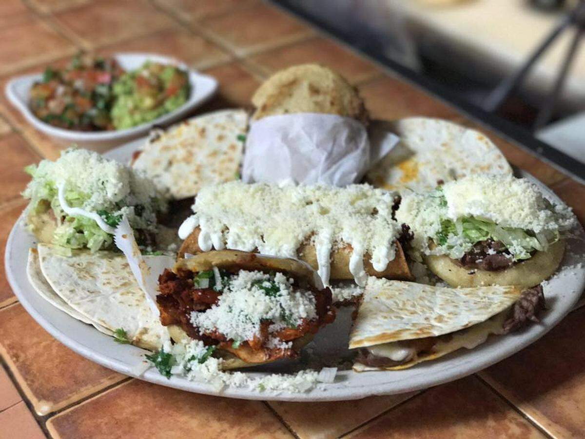 Flautas, sopes, gorditas and quesadillas de chilanga served with fresh guacamole and pico de gallo at Mi Rinconcito Mexico.