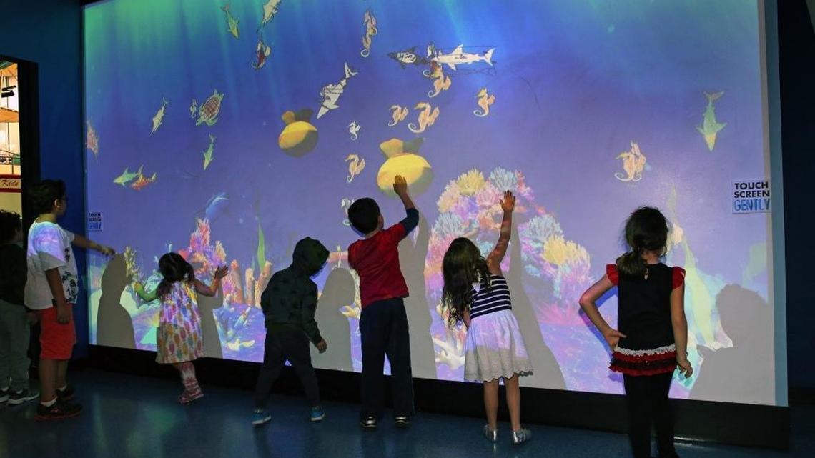A giant touch-screen interactive aquarium is one of the new features at the Miami Children’s Museum.