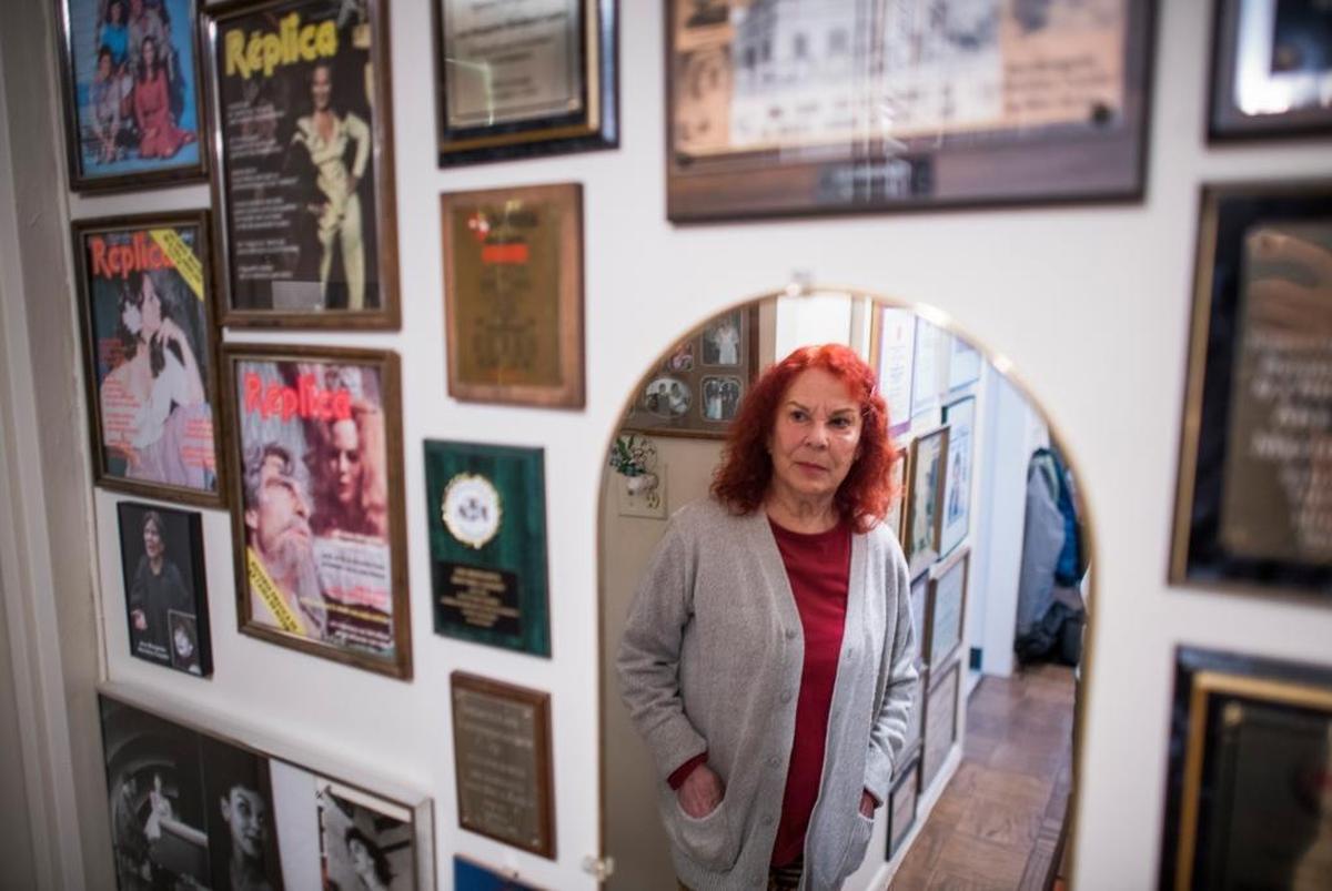 New York Actress Ana Margarita Martinez Casado amongs photographs and awards associated with her career, in her Manhattan apartment near New York City's midtown theater district. She played the character of Juana Peña on the 1970s PBS show, "Que Pasa, U.S.A.?" the first bilingual show on television. Recently, a stage play has been made about the show, using the original cast's images without their consent and they are upset.