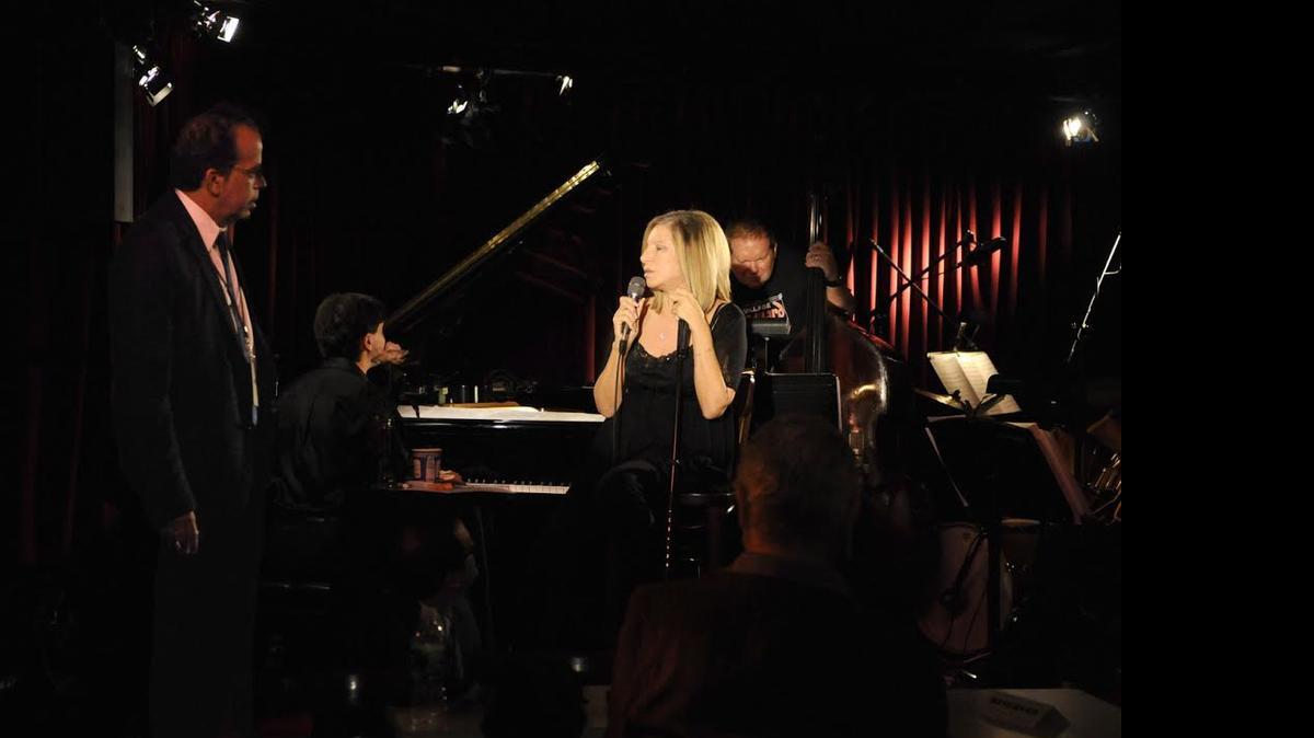 
Director-writer Richard Jay-Alexander talks to Barbra Streisand before a concert at the Village Vanguard.
