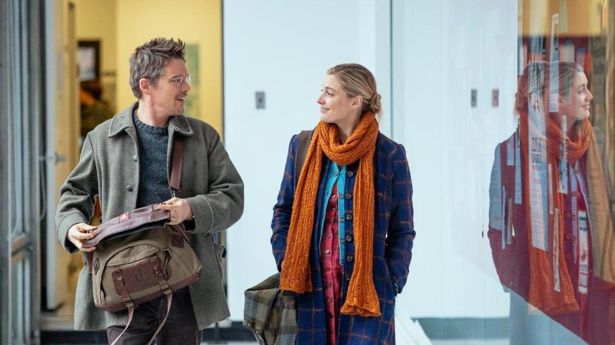 John (Ethan Hawke) and Maggie (Greta Gerwig) meet cute at work and fall in love in ‘Maggie’s Plan.’