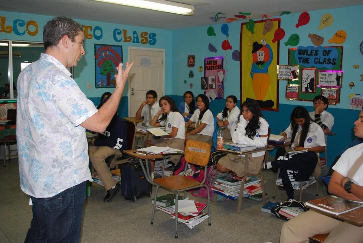 Richard Blanco, the Miami-raised poet who delivered his poem ‘One Today’ at President Barack Obama’s second inauguration, teaches poetry to students at the bilingual school at Our Little Roses in San Pedro Sula, Honduras.