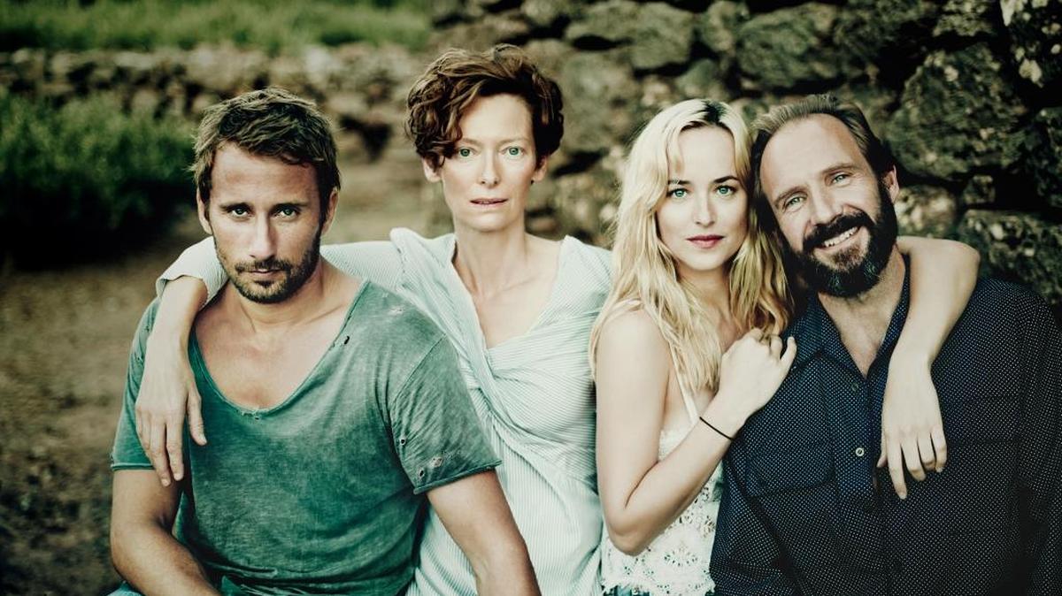 (l. to r.) Matthias Schoenaerts, Tilda Swinton, Dakota Johnson and Ralph Fiennes have a complicated relationship in ‘A Bigger Splash.’