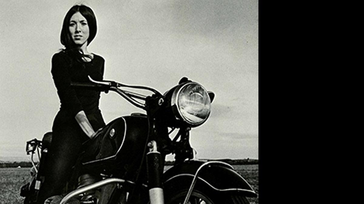 
A member of Skidmore College’s class of 1969 poses on a motorcycle for a portrait featured in the documentary ‘Women of ‘69, Unboxed.’
