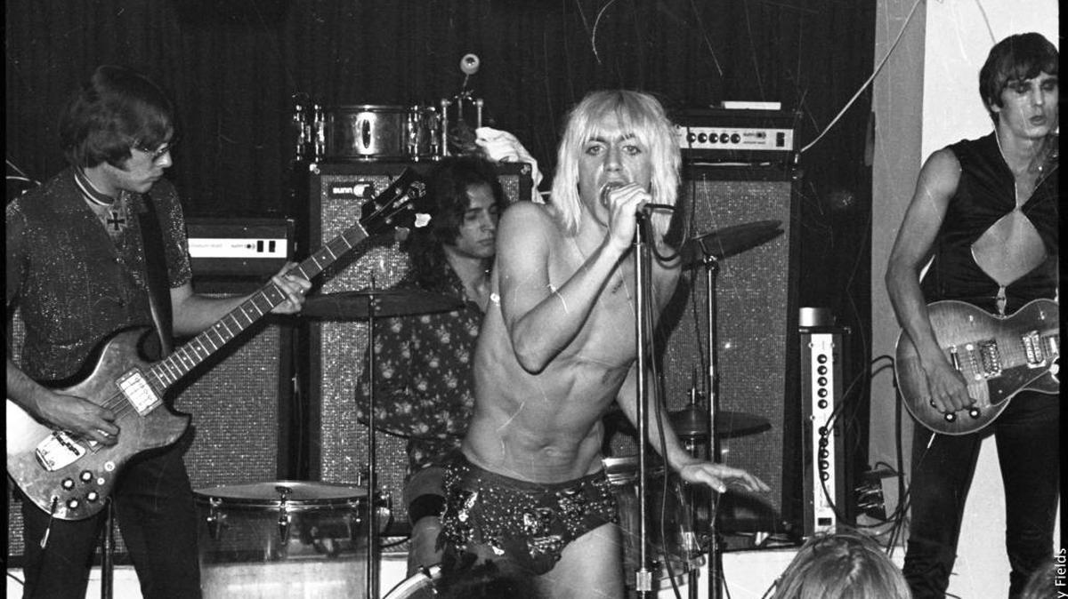 Iggy Pop (center) performs with the punk-rock band The Stooges in a scene from ‘Gimme Danger.’