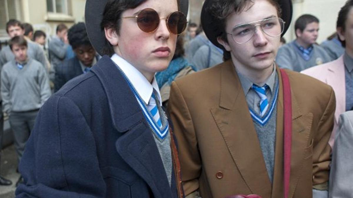 Conor (Ferdia Walsh-Peelo) and Eamon (Mark McKenna)head to school with a new look in ‘Sing Street.’