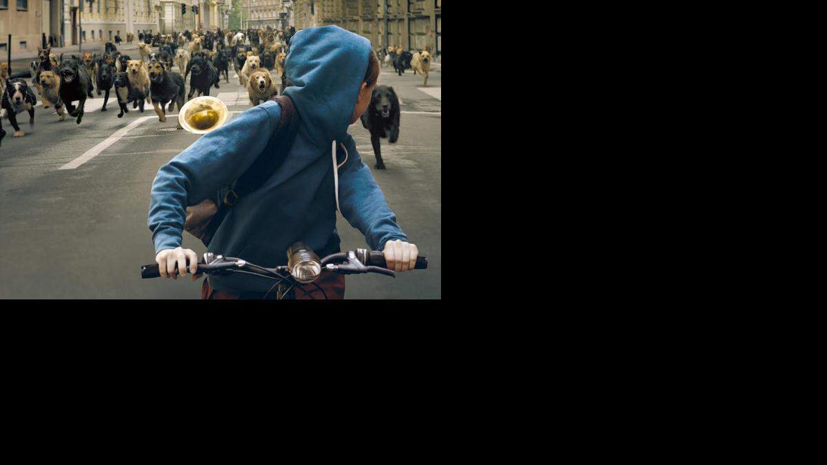 
A teenage girl (Zsofia Psotta) is chased by a pack of wild dogs in the opening of ‘White God.’

